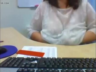 Webcam Secretary Flashes Her Heavy Hangers in the Office